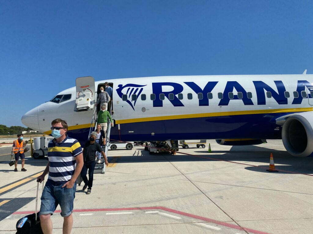 Passengers disembarking from a Ryanair Boeing.